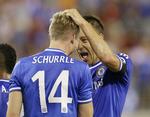 Champions. John Terry (bagerst) og det tyske nyindkøb Andre Schürrle er et solidt bud på en kommende engelsk mesterklub. Også hvis man spørger en computer. 