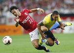 playoff. Arsenals Theo Walcott (th) har ikke fået ny angrebsmakker trods Londonklubbens forsøg på at gøre store indkøb før sæsonstart. 