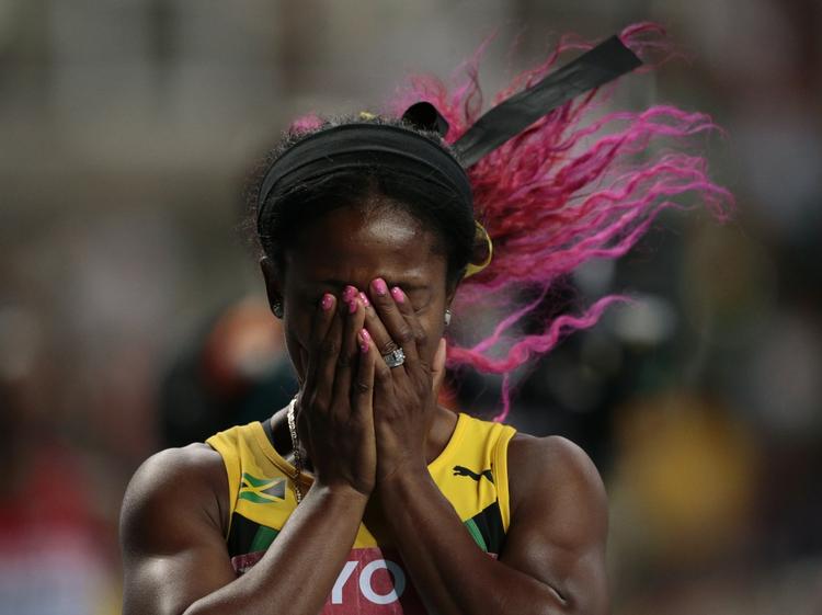 Jubel. Shelly-Ann Fraser-Pryc blev  verdensmester med årets bedste tid 10,71 sek. 