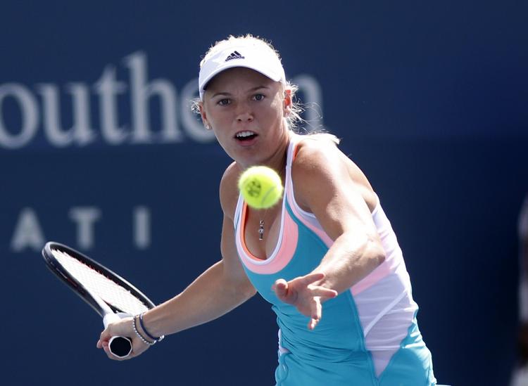 OPTUR. Tre sejre i Cincinnati sender Caroline Wozniacki to pladser frem på verdensranglisten. 