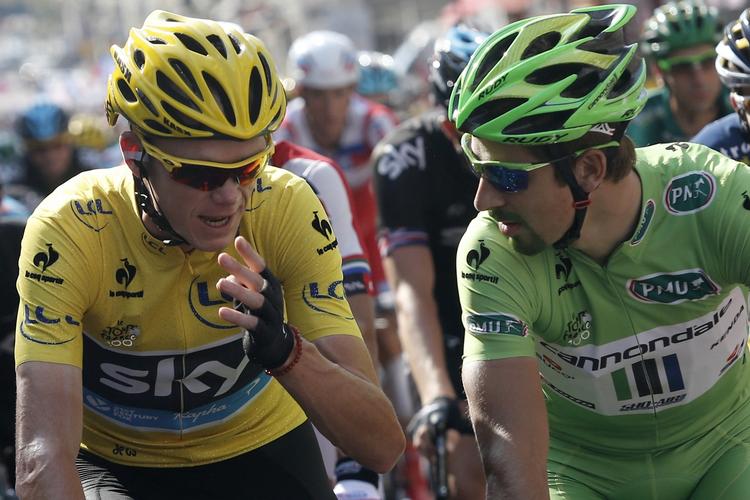 lussing. Peter Sagan (th) sejrede i flot stil, mens Tourvinder Chris Froome (tv) røg bagud i USA. 