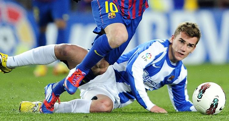 Ubarmhjertig. Antoine Griezmann - her fanget under en kamp mod Barcelona i sidste sæson - stod for aftenens bedste individuelle præstation i Champions League-kvalifikationen. 