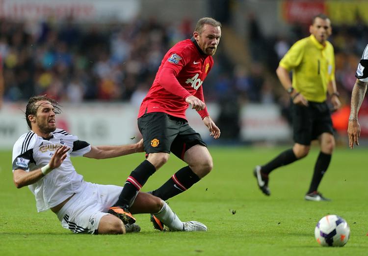 halsende. Swansea åbnede kampen mod Manchester United godt, men endte med at indkassere et stort nederlag mod de effektive mestre. 