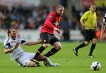 EFTERTRAGTEDE. I lørdags spillede Michu og Wayne Rooney mod hinanden, men begge er eftertragtede og kan få nye klubber frem til 2. september. 