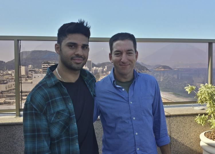 Lækage. Britisk politi vil nu efterforske David Miranda (t.v.), partner til Glenn Greenwald (t.h), den journalist på The Guardian, der har offentliggjort Snowden-afsløringer. 