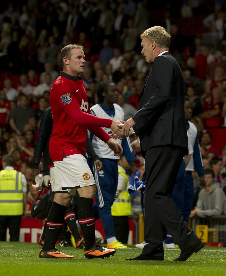 Spekulationer. Hvem vil Moyes (th) købe? Og bliver Rooney (tv) i United? Vi er meget klogere 3. september, når transfervinduet er lukket. 