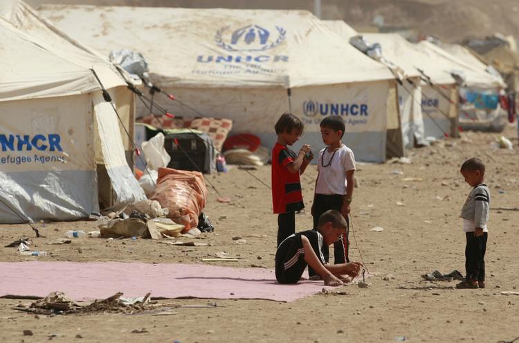 Flygtningelejr. Irak har modtaget mange tusinder af de to millioner syrere, der allerede er flygtet fra borgerkrigens rædsler. Heriblandt mange børn. Ifølge FN er en million syriske børn nu på flugt. 