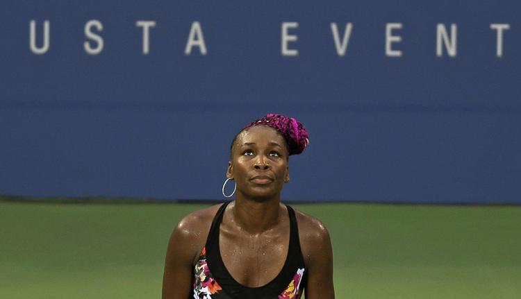 Tennis. Venus Williams blev slået ud i anden runde af US Open på regnvåd dag. 