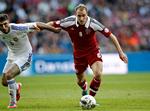 solgt? Christian Eriksen (th) ser ud til at være tæt på et skifte til Tottenham, som forsøger at forstærke den offensive midtbane med de ventede millioner fra et salg af stjernen Gareth Bale. 