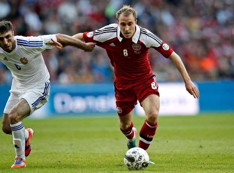 solgt? Christian Eriksen (th) ser ud til at være tæt på et skifte til Tottenham, som forsøger at forstærke den offensive midtbane med de ventede millioner fra et salg af stjernen Gareth Bale. 