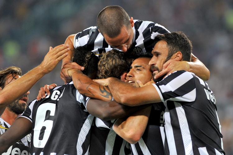 Succes. Juventus-spillerne fik hele fire muligheder for at kramme hinanden i løbet af kampen mod Lazio. 