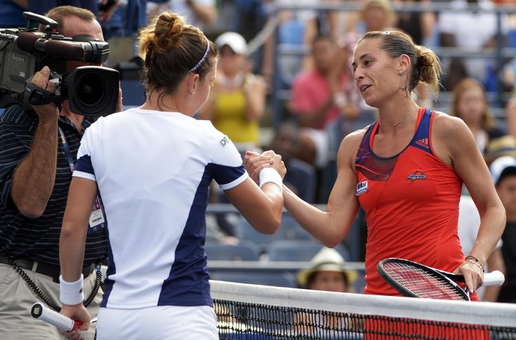 veteran. Italienske Flavia Pennetta (th) har spillet sig videre i både single og double ved US Open. 