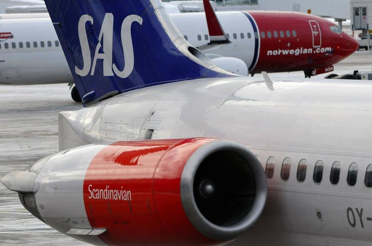snært. De ligger næsetip om næsetip, Norwegian og SAS, når det handler om, hvor mange passagerer, der vælger at flyve med dem. 