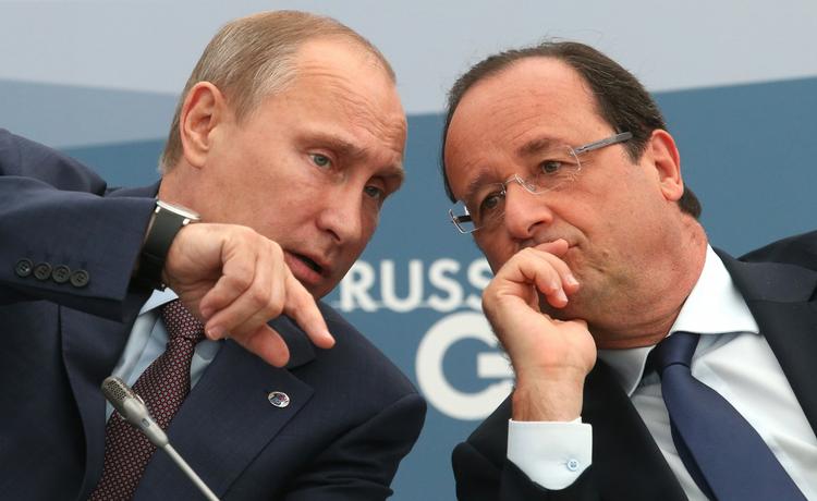 Uenige. Franske  Francois Hollande, th, sammen med Ruslands Vladimir Putin. De to er uenige om, hvad der skal ske i Syrien. 