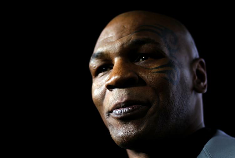 Fjerelsker. Han kan virke en anelse skræmmende, men Mike Tyson er i virkeligheden en meget blød fyr med hang til duer. 