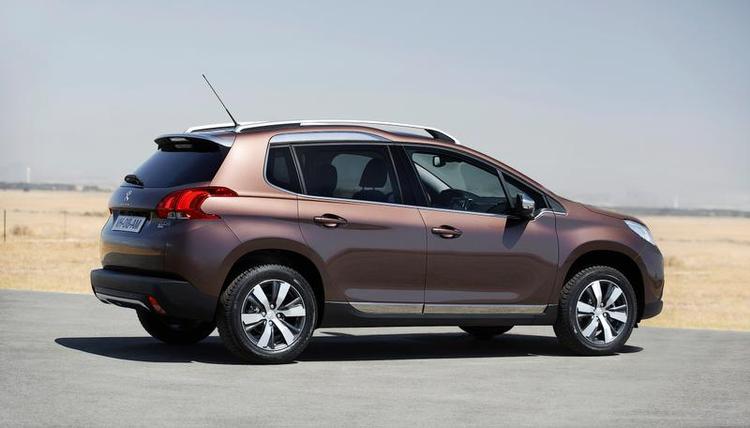 Vokseværk. Peugeot 2008 er ngoet højere og mere rummelig end slætningen 208. 