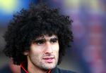 kult. Maouane Fellainis hårstil har skabt mode blandt tilhængere i Everton - og nu også Manchester United - hvor fans møder op med store sorte mikrofonhårs-parykker. 