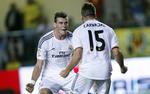 Debutkamp. Real Madrid's Gareth Bale fejrer sin scoring mod Villareal i sin debutkamp efter rekordsalg. 