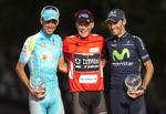 PODIET. De tre bedste i Vueltaen blev Chris Horner (i midten), Vincenzo Nibali (tv.) og Alejandro Valverde (th.). 