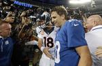 Familietræf. Peyton Manning (18) blev vinderen i broderdysten mod Eli (10). 
