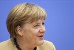 Optur. Delstatsvalget i Bayern giver Merkel medvind til søndagens forbundsdagsvalg. 