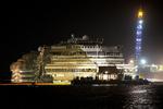 Bjærgning. Det er lykkes at bringe det forliste krydstogtskib Costa Concordia fri af revet og tilbage til flydende position. 