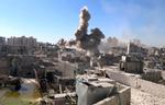 Dagligdag. Mens det internationale spil fortsætter, fortsætter også krigen i Syrien. Her et aktuelt billede fra Damaskus, verificeret af AP. 