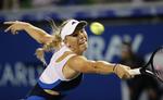 Videre. Wozniacki er klar til 1/(-finalen i Beijing. 