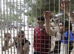Tragedie. Overlevende fra det seneste forlis er spærret inde i en lejr på øen Lampedusa. 