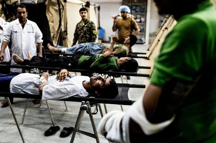 Ofre. Afghanske soldater er blevet såret ved Sangin, der er et af de områder, som Nato reelt anser for tabt. Andre områder i Helmand står muligvis for fald, når de vestlige tropper rykker ud. 