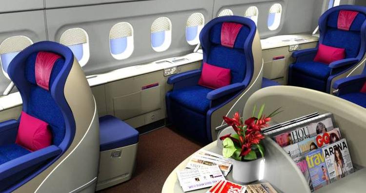 luksus. Flere og flere almindelige danskere vælger at betale ekstra for at sidde på de gode pladser forrest i flyene - f.eks. som her Malaysia Airlines' business class. (Arkivfoto) 