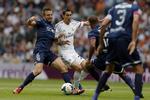 2-0. Angel Di Maria (midt) scorede første mål for Real Madrid i kampen mod Malaga. 