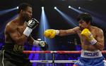 pengeproblemer. Shane Mosley (tv) under gigantmødet med  Manny Pacquiao om VM-titlen i maj 2011. 