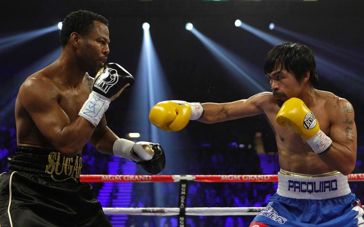 pengeproblemer. Shane Mosley (tv) under gigantmødet med  Manny Pacquiao om VM-titlen i maj 2011. 