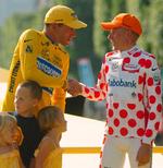 7'er. Michael Rasmussen var på podiet med Lance Armstrong ved afslutningen af Tour de France i 2005 som vinder af bjergkonkurrencen. 