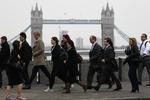 morgenholdet. Ansatte krydser London Bridge på vej til job i City, hvor Londons finanscentrum findes. 