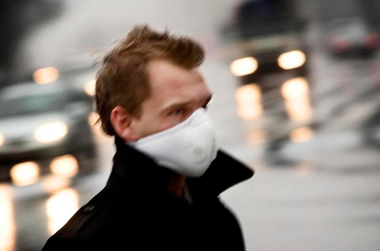 Maskeret. en læser vil vide om vi burde bære masker mod forurening i København, som de gør i flere asiatiske storbyer. 