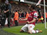 2-0. Arsenal's Santi Cazorla jubler efter at have bragt holdet foran 1-0 i kampen mod Liverpool. 