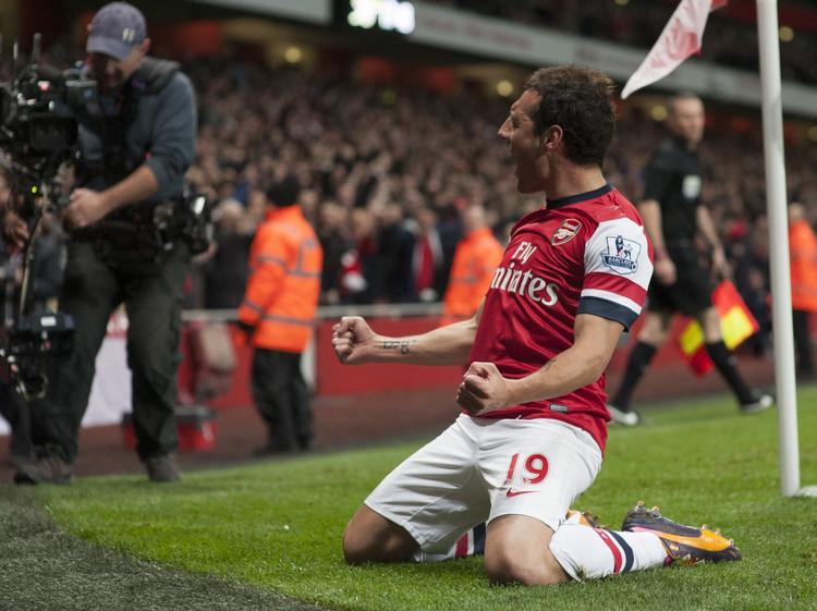 2-0. Arsenal's Santi Cazorla jubler efter at have bragt holdet foran 1-0 i kampen mod Liverpool. 
