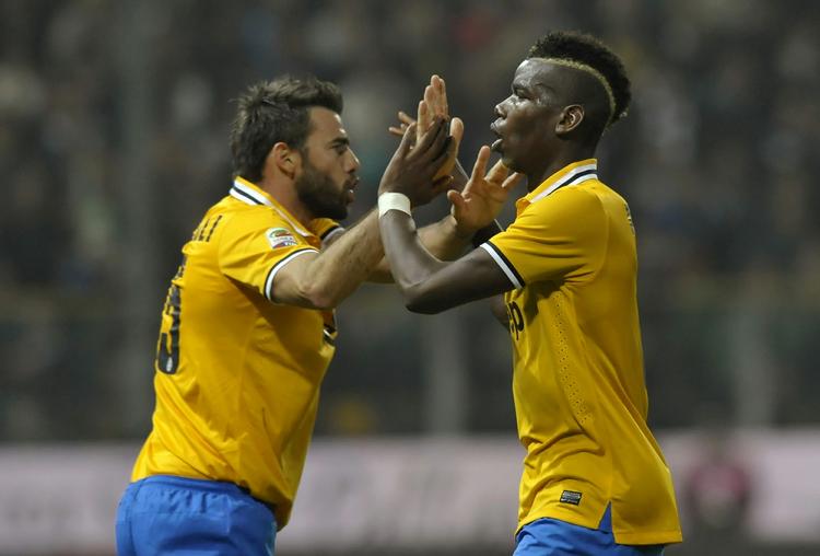 liga-form. Juventus' Paul Pogba (th) scorede i weekenden sejrsmålet for holdet i kampen mod Parma. 
