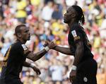 HALVERET. Stjerneduoen Wesley Sneijder (tv.) og Didier Drogba (th.) er halveret i aften mod FCK. 