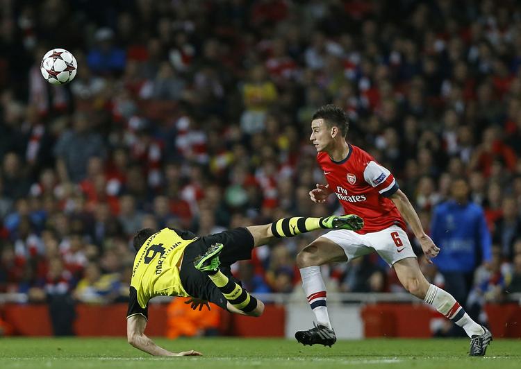 Revanchetid. Arsenal og Laurent Koscielny (th) tabte for 14 dage siden på hjemmebane til Dortmund. 