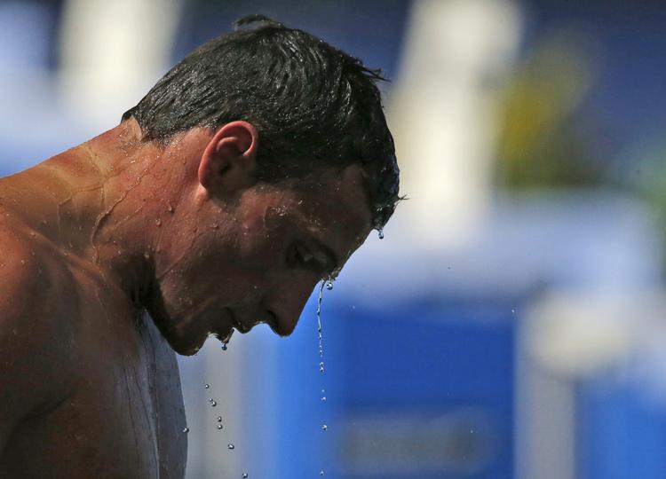 idoliseret. Ryan Lochte stiger op fra bassinet efter mændenes 100-meter finale i butterfly ved VM i Barcelona i Barcelona. 