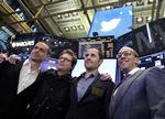 RIGE. Det blev en festlig dag for Twitterfolkene på New Yorks fondsbørs. Fra venste ses Jack Dorsey, grundlægger og bestyrelsesformand, Biz Stone, der også var med til at starte firmaet samt Evan Williams, tredje stifter. Yders Dick Costolo, der er adm. direktør. 