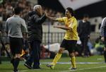 titel. Træner for  Guangzhou Evergrande, Marcelo Lippi (tv) jubler med målscorer i finalen,  Elkeson de Oliveira Cardoso. 