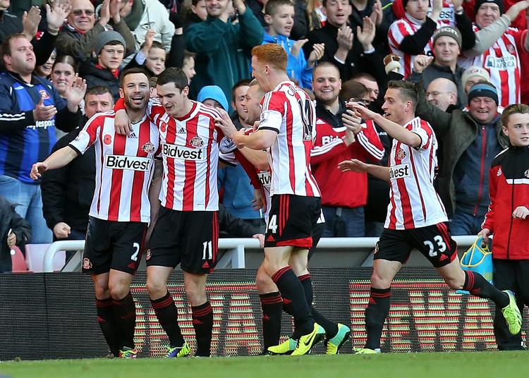 JUBEL. Phil Bardsley (tv) og Sunderland har hentet 6 af deres 7 point i ligaen under den nye manager Gus Poyet. 