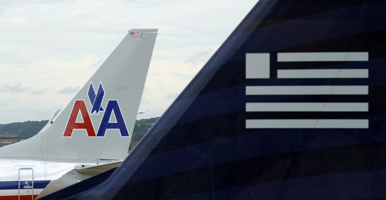 Størst. De amerikanske konkurrencemyndigheder under justitsministeriet i Washington DC har godkendt fusionen mellem de to store flyselskaber American Airlines og US Airways. 