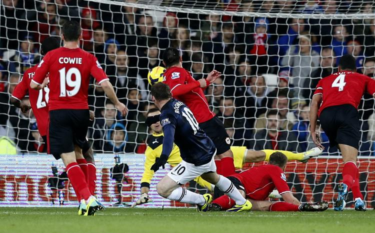 Mål Wayne Rooney var på pletten på Cardiff City Stadium og er nu oppe på 6 scoringer i ligaen i denne sæson. 