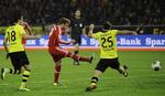Hjemvendt. Mario Goetze fra Bayern scorer kampens første mål mod sin gamle klub Borussia Dortmund på sin gamle hjemmebane. 