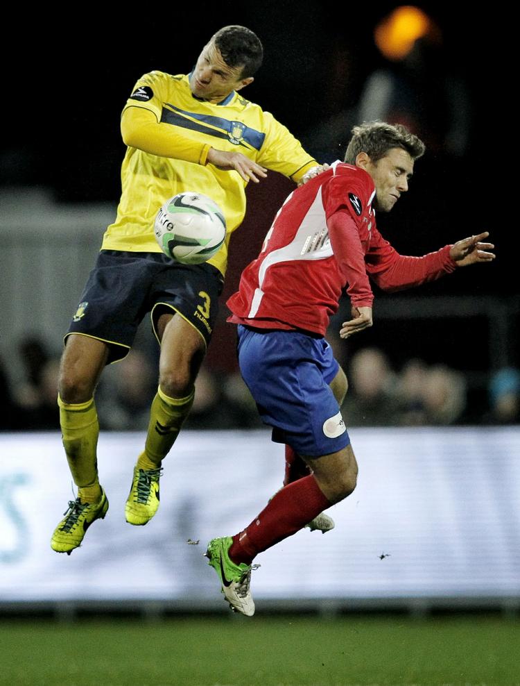 Klasse. Brøndby er ubesejret med Khalid Boulahrouz (tv) på holdet. 10 point er det blevet til i fire kampe - og der er endnu ikke scoret mod mændene fra Vestegnen i den nye forsvarschefs regeringstid. 